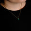 ‘Erosion’ lab emerald 10k gold pendant