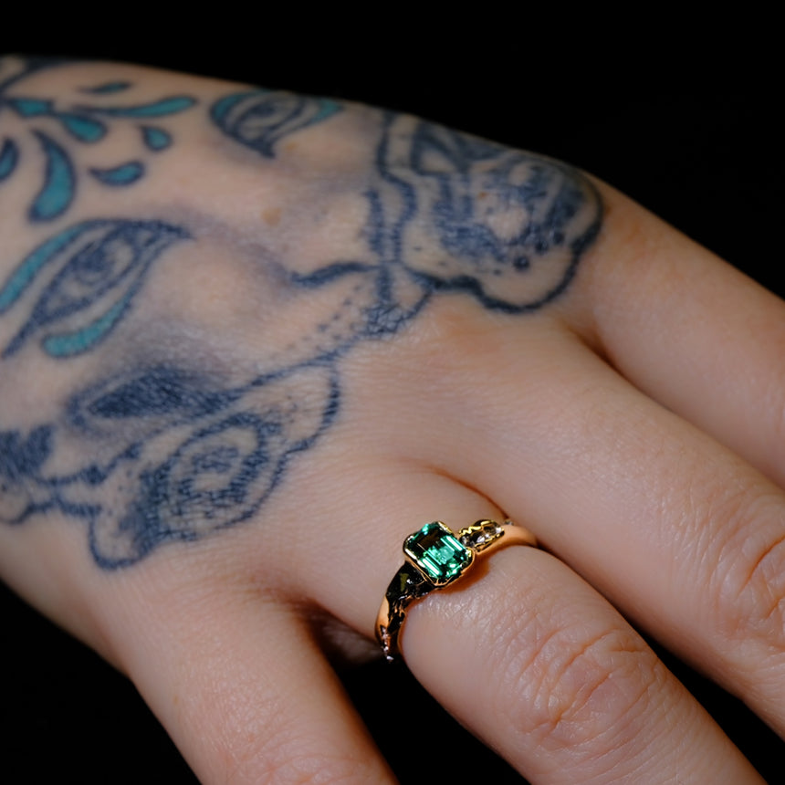 ‘Erosion’ lab emerald and 10k gold ring