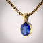 Erosion lab sapphire and 10k gold pendant