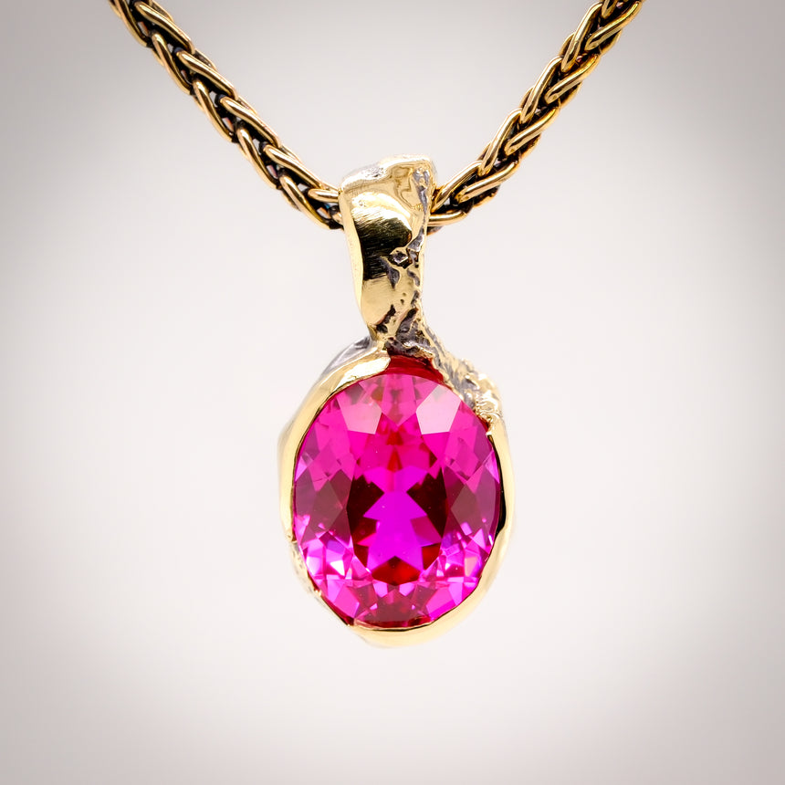 Erosion pink lab sapphire 10k gold pendant