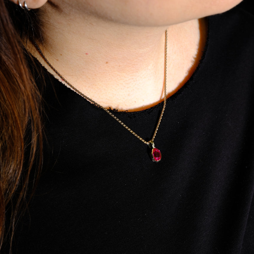 Erosion pink lab sapphire 10k gold pendant