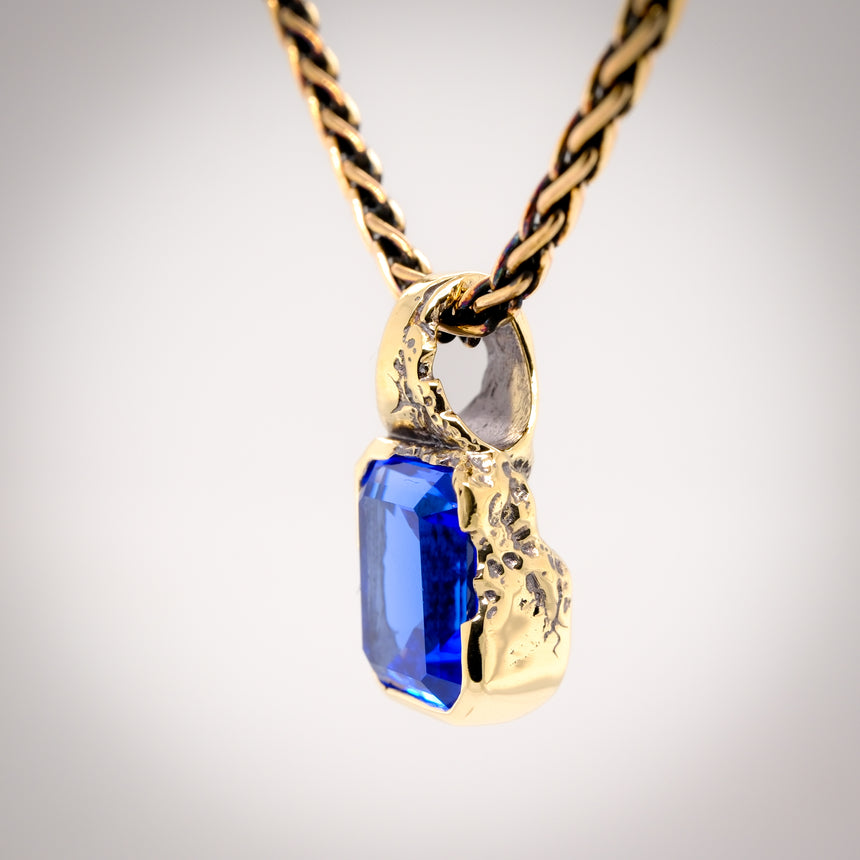 Erosion lab spinel and 10k gold pendant