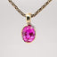 Erosion pink lab sapphire 10k gold pendant