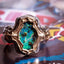 Dark Galaxy boulder opal ‘Earthset’ ring
