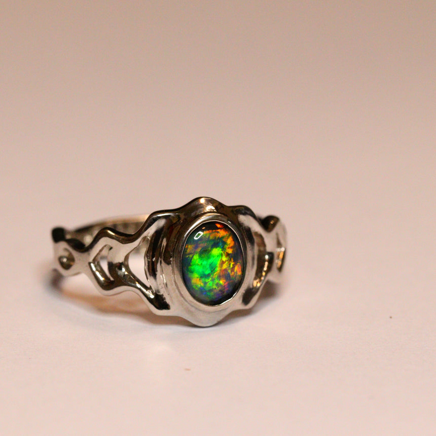 Platinum and black opal ring