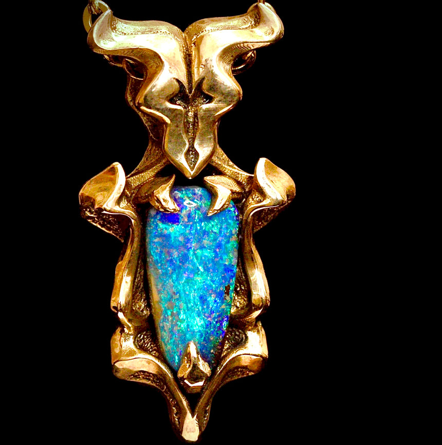 Boulder opal & gold pendant