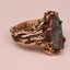 Koroit matrix opal in dark gold ring